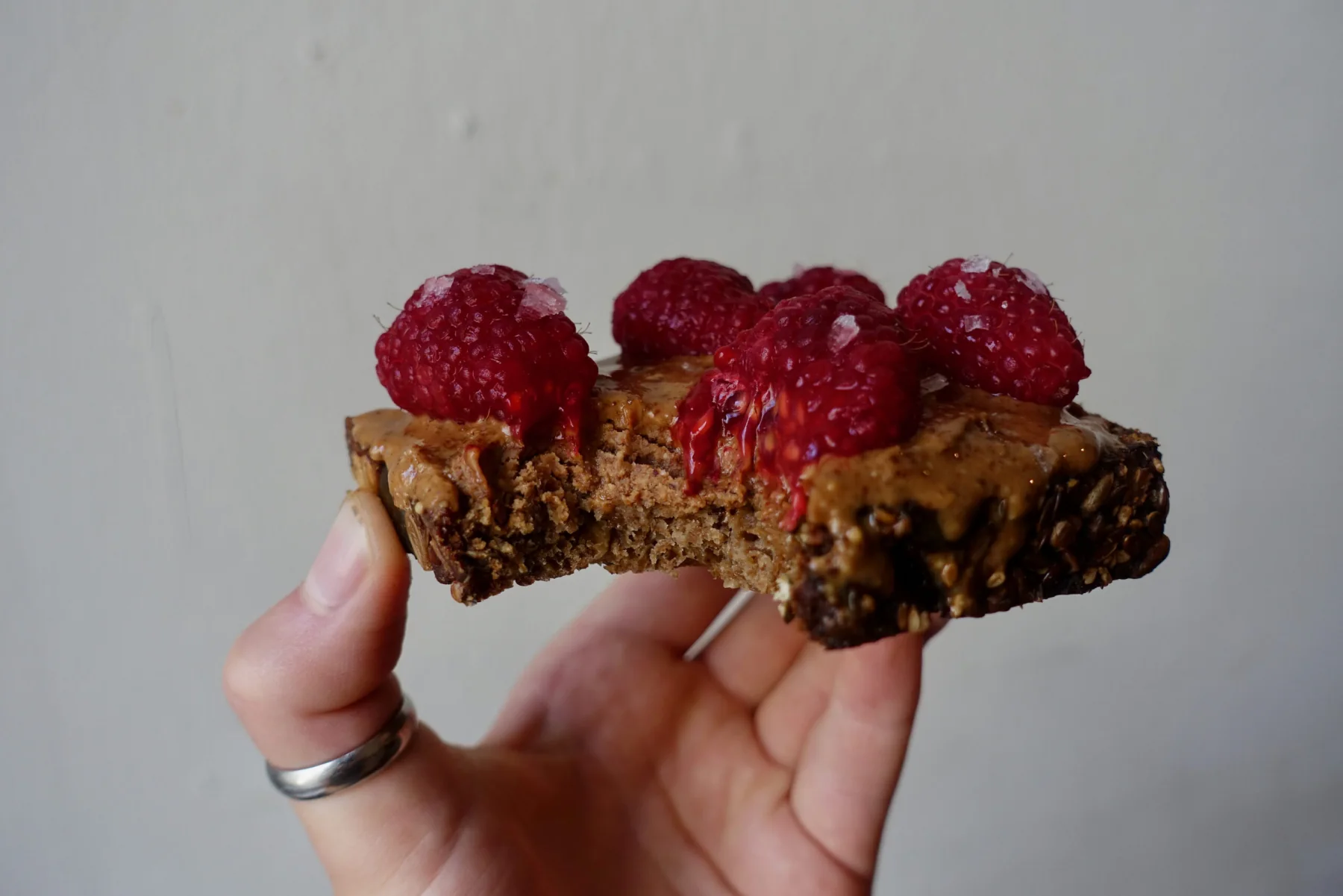 Almond butter with raspberries and salt
