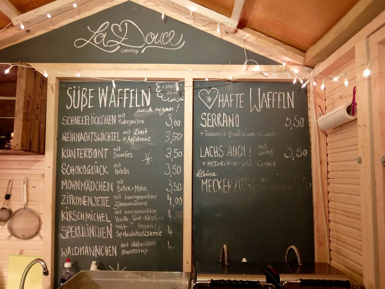 Menu at the La Douce waffle stand at the Apostelkirche Christmas market