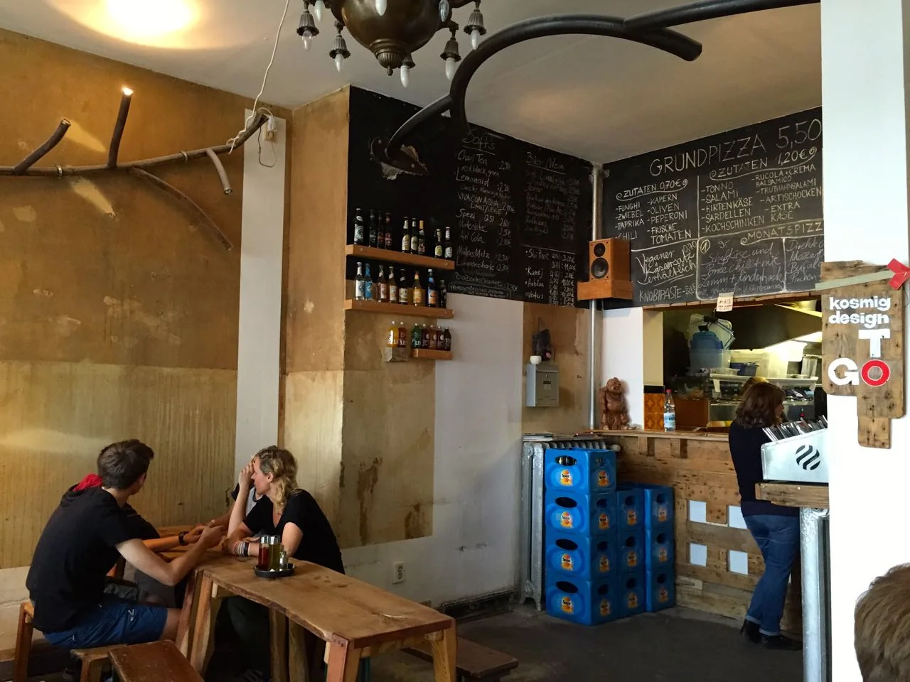 Interior and menu boards at Slimjims pizza restaurant in Hamburg